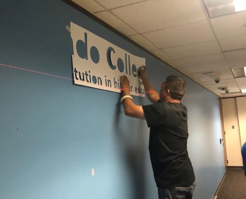 Using a stencil makes sure dimensional letters are installed perfectly. Using a stencil and laser aligns the graphics perfectly.